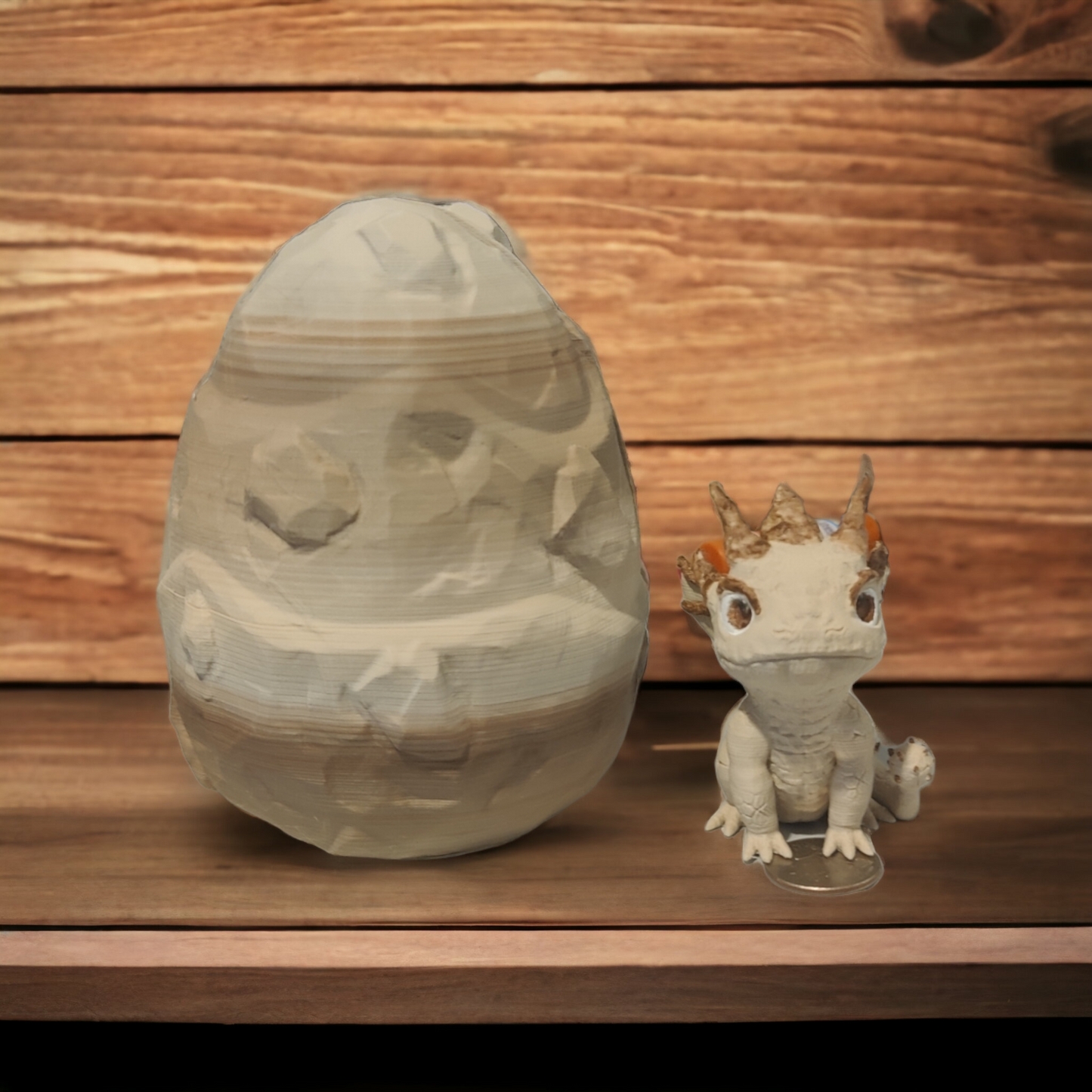 Stone dragon baby with egg